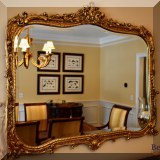 D22. Gilt mirror with beveled edge. 40”h x 48”w - $650 